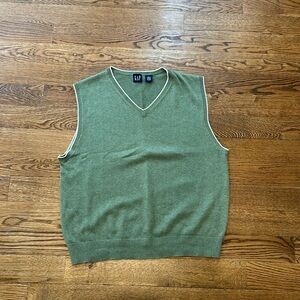 green sweater vest